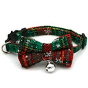 Festive pet collar with snowflake bowknot, bell, and adjustable breakaway buckle for safety.