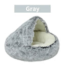 Gray plush pet bed with cozy cave design, perfect for cats and small dogs to snuggle during winter.