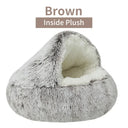 Brown plush round pet bed with removable cover, ideal for cats and small dogs, offering warmth and comfort as a cozy sleeping nest.