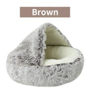 Brown plush pet bed with removable cover, round design for cats and small dogs, warm and cozy for winter.