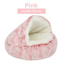 Pink plush round pet bed with removable cover, ideal for warm cat or dog sleeping nest.